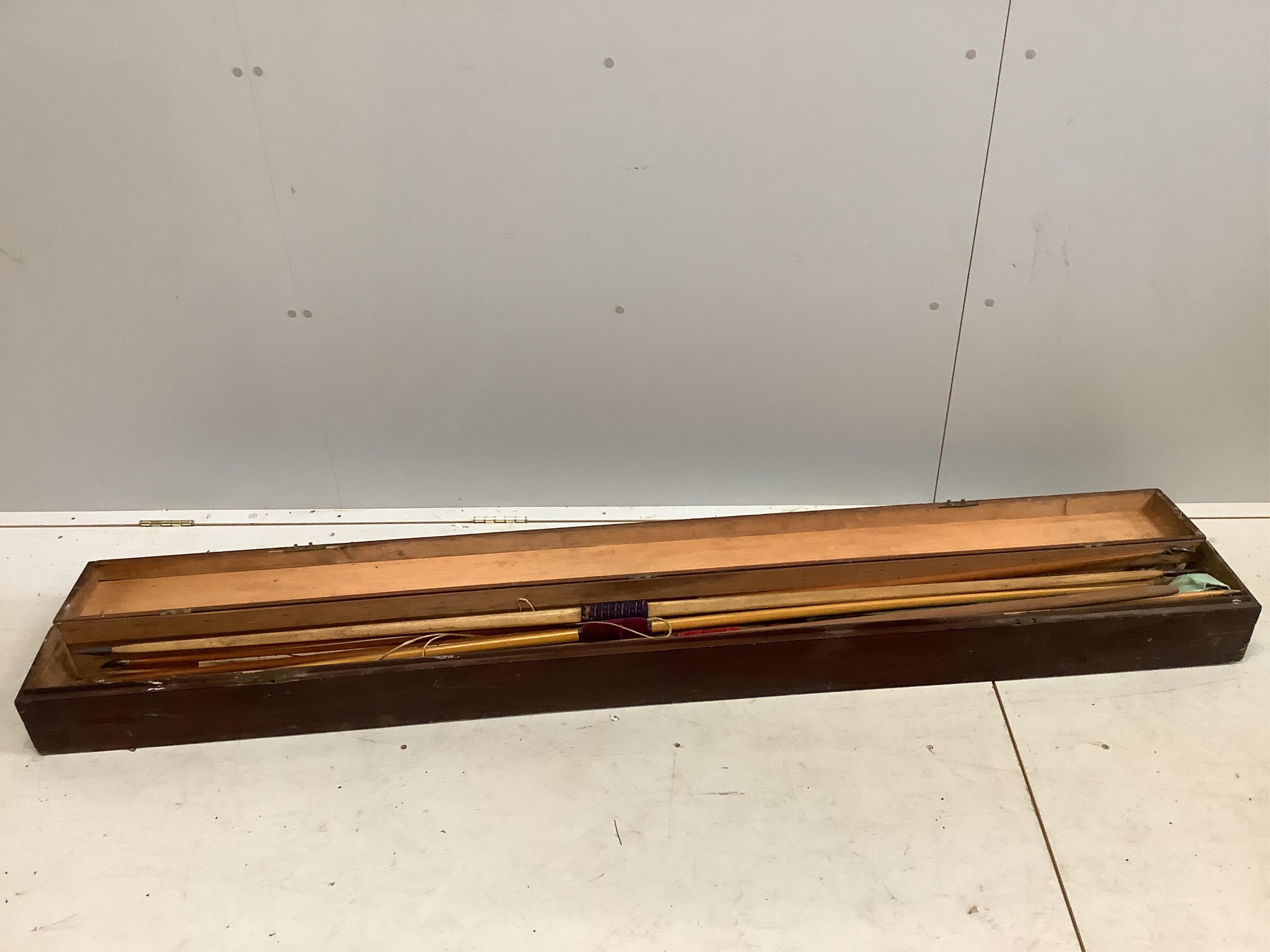 Five Victorian and later archery longbows, a blank for a longbow, and a selection of arrows, boxed. Condition - poor to good.